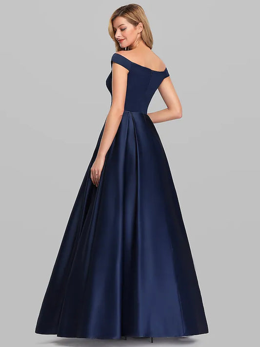Sleeveless ruched charmeuse dress for formal occasions.