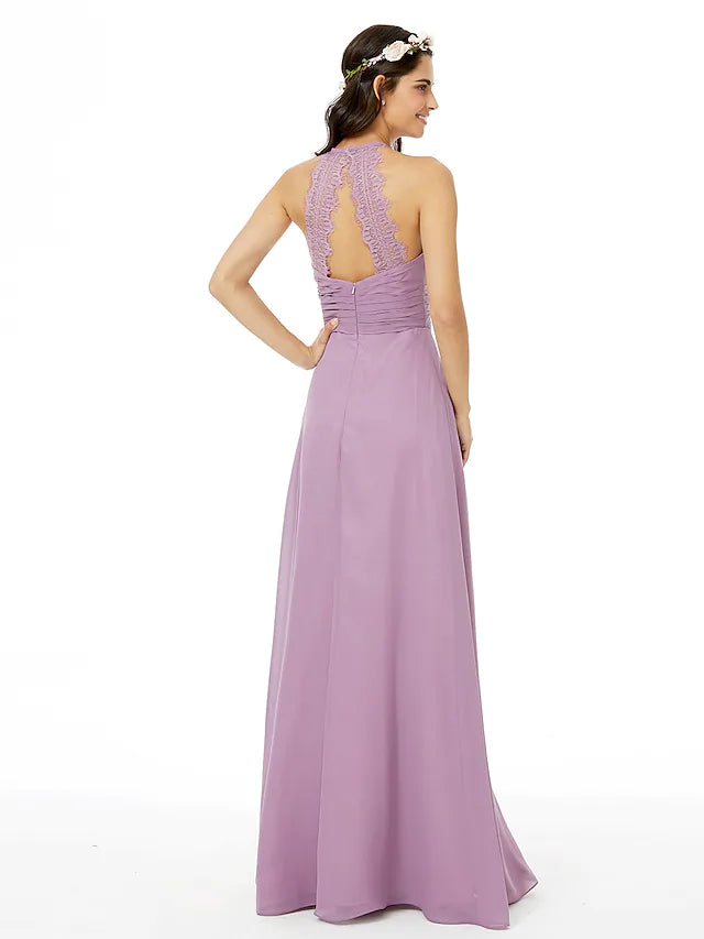 Side profile of a floor-length chiffon bridesmaid gown.