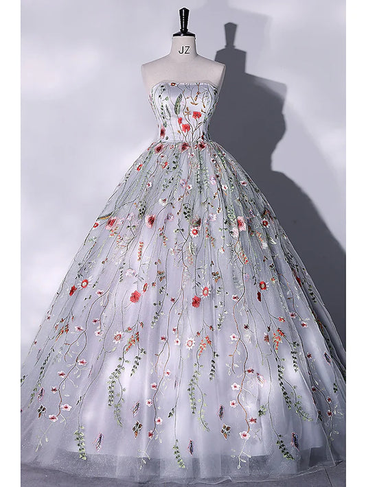 Elegant blush strapless ball gown with lace appliques.