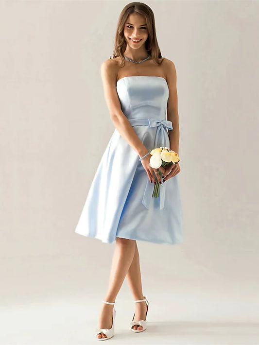 Elegant strapless satin knee-length bridesmaid dress with a sash.
