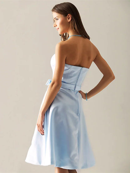 Side view of the elegant strapless satin bridesmaid dress.