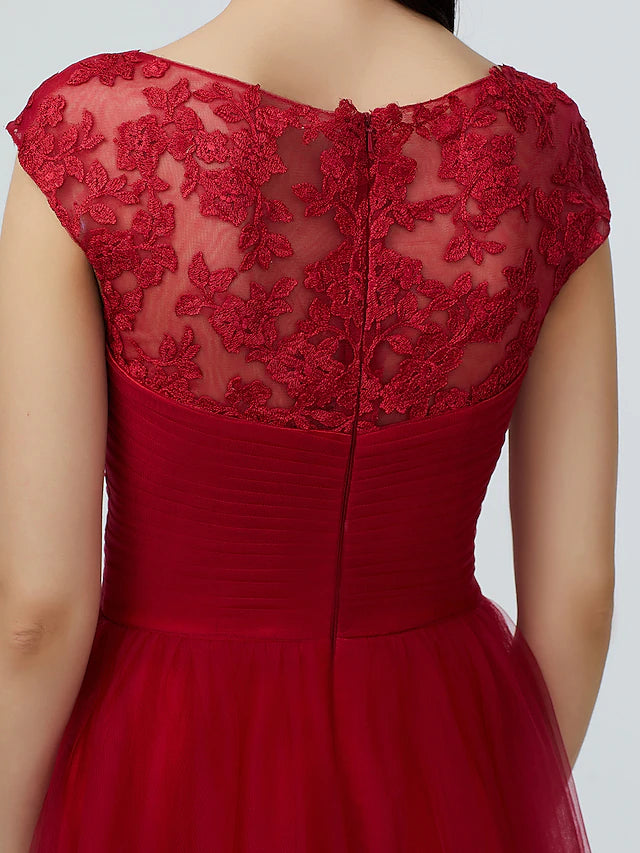 Bridesmaid dress featuring sparkling lace and pleated tulle fabric.